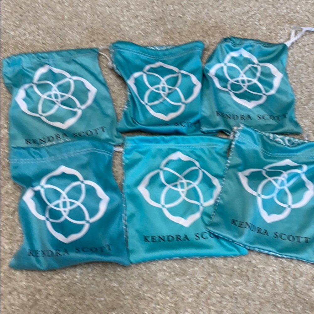 Six Kendra Scott pouches